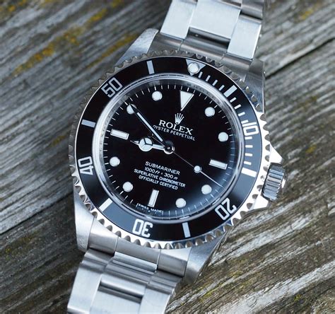 difference between rolex submariner 14060 and 14060m|Rolex 14060m production years.